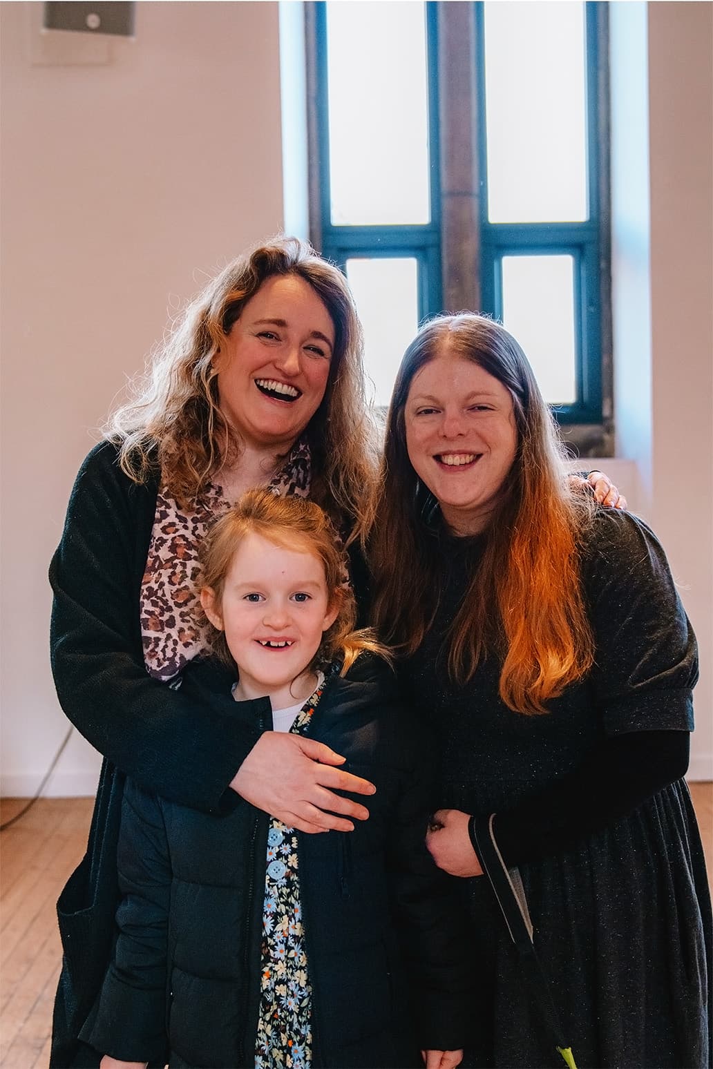 A group of C3 Edinburgh members smiling together for a photo