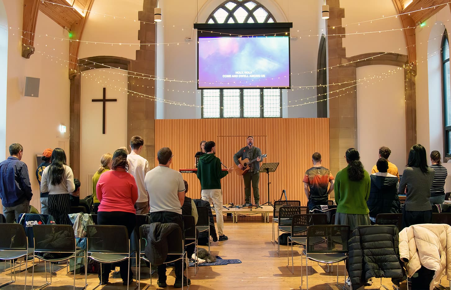 The congregation gathered for sung worship at a C3 Edinburgh Sunday service in the hall at Greyfriars Charteris Centre